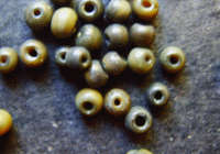 Dark Grey Cats Eye Uneven Rounds, +-4mm, - Pack of 50.