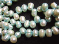 Light Blue Side Drilled Freshwater Pearls , +/-8mm X 10mm - Pack of 10.