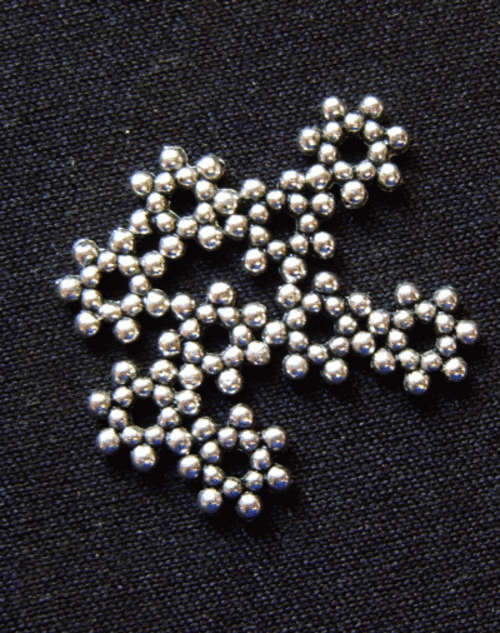 Nickle Daisy Spacer, 7mm - Pack of 100.