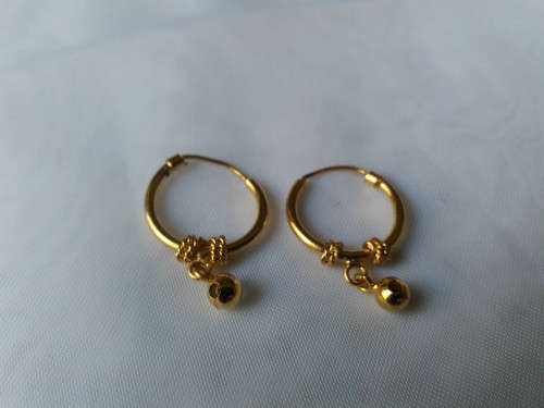 Gold tone hoop earrings