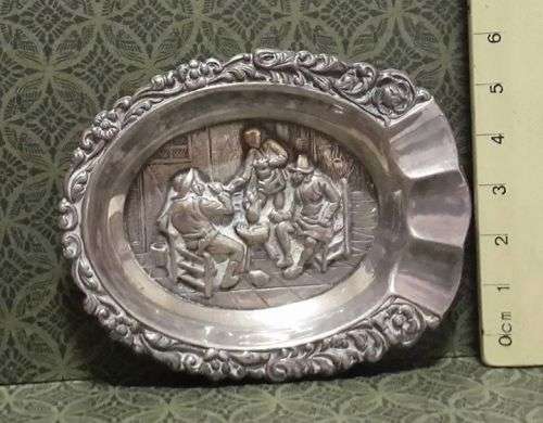 Embossed ashtray