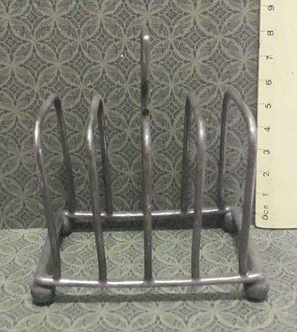 Toast rack with a lot of markings!! - not silver
