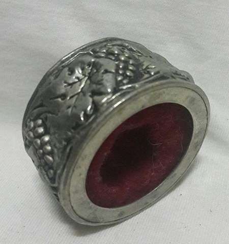 Decorative wine bottle drip catcher