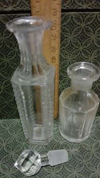 Cut glass bottle with stopper and lead crystal bottle