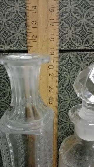 Cut glass bottle with stopper and lead crystal bottle