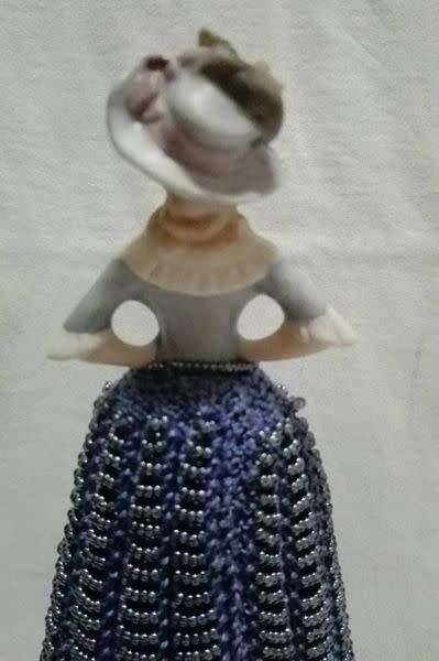 Porcelain half doll with beaded dress. Beautiful!!