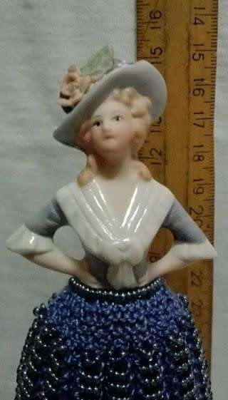 Porcelain half doll with beaded dress. Beautiful!!