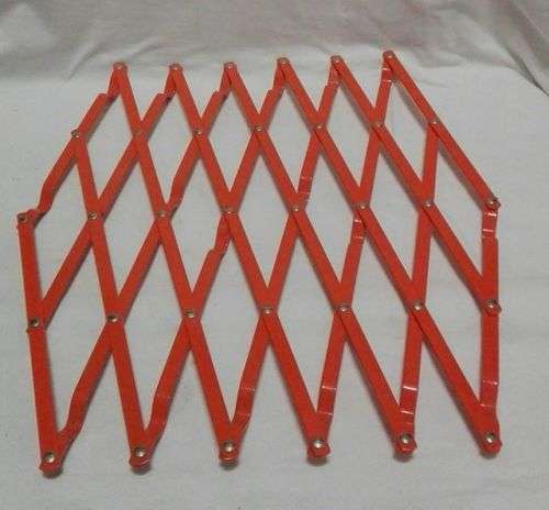 Vintage expandable trivet - orange!