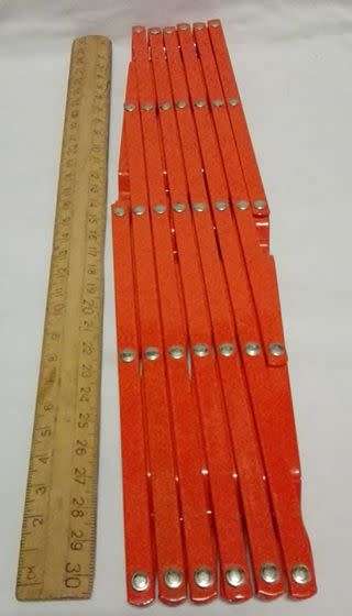 Vintage expandable trivet - orange!