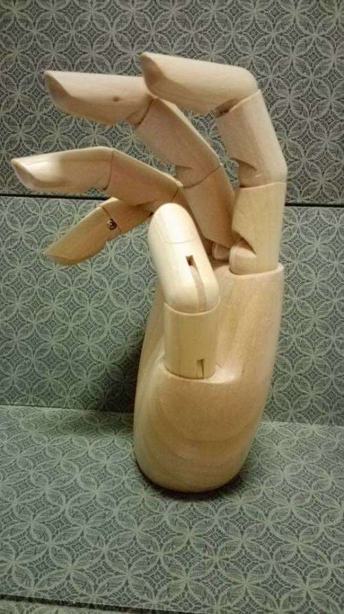 Pretty and well made wooden hand
