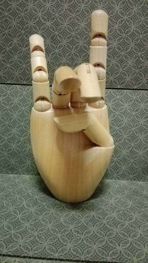 Pretty and well made wooden hand