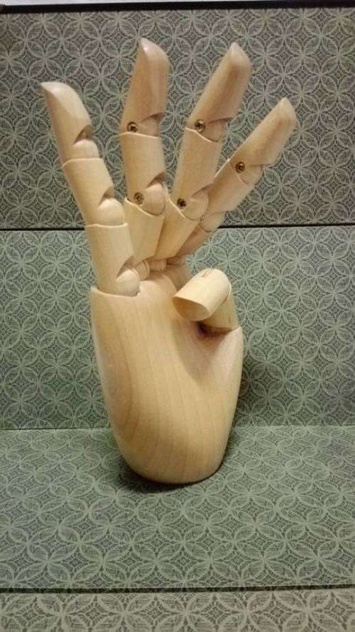 Pretty and well made wooden hand
