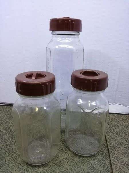 Vintage Glass Baby Bottles Everflow  With Lids!