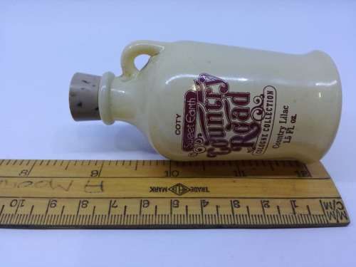 Vintage Coty Sweet Earth Country Road Country Lilac Cologne bottle