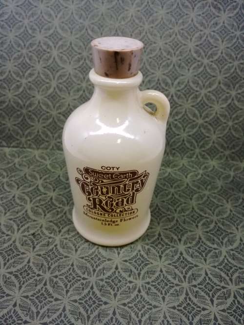 Vintage Coty Sweet Earth Country Road Country Mountainledge Cologne bottle - still has content
