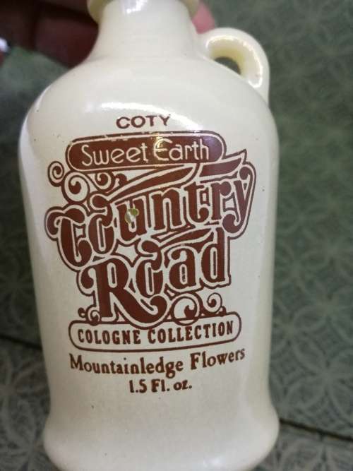 Vintage Coty Sweet Earth Country Road Country Mountainledge Cologne bottle - still has content