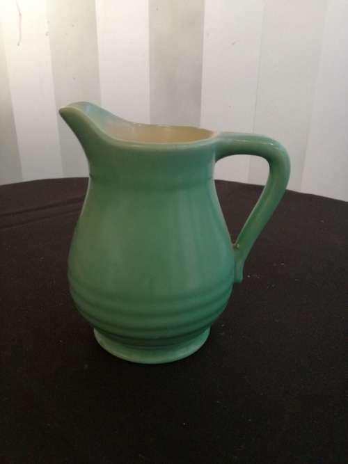 Vintage green milk jug