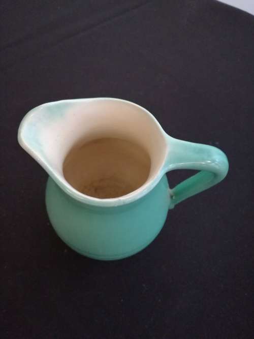 Vintage green milk jug