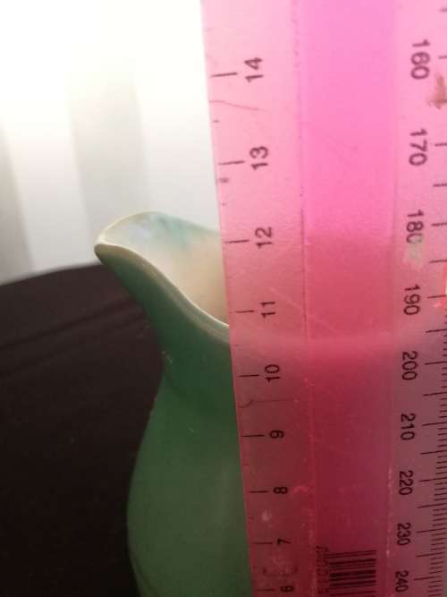 Vintage green milk jug