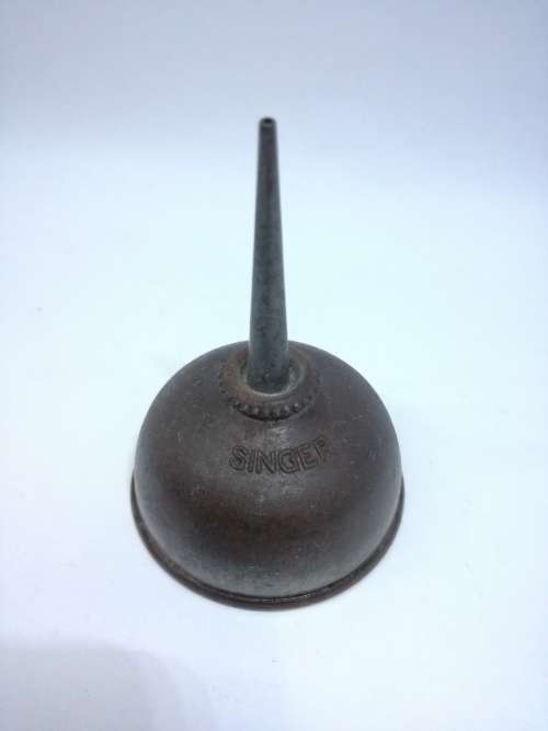Singer oil can