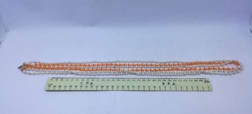 Stunning orange and white plastic necklace