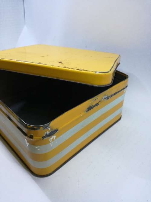 Yellow striped tin