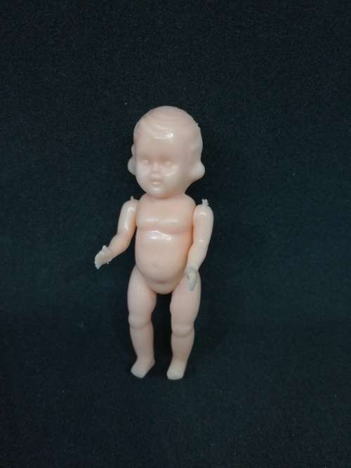 Vintage small Hard plastic doll