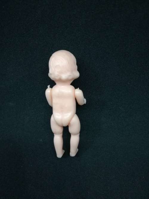 Vintage small Hard plastic doll