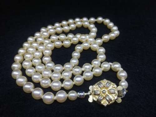 Perfect string of beautiful faux pearls