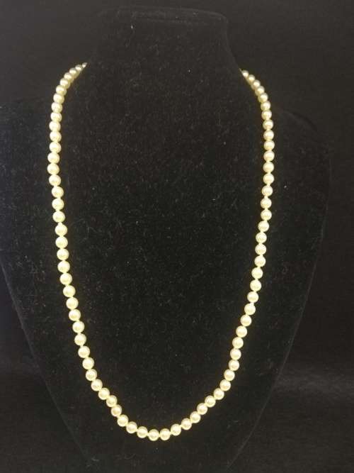 Perfect string of beautiful faux pearls