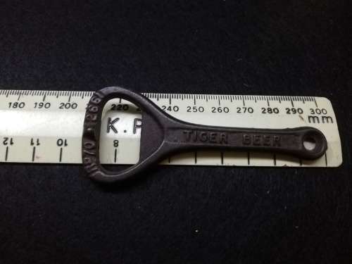 Bottle opener, cast iron, `Tiger Beer`