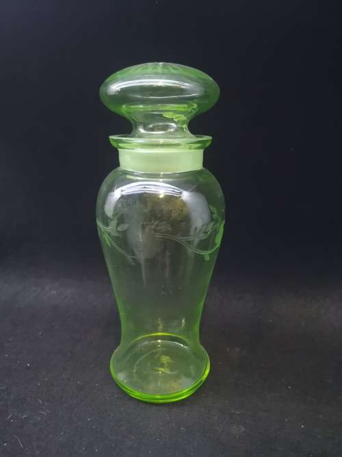 Uranium glass container - the lid has damage but you cant see it when displayed