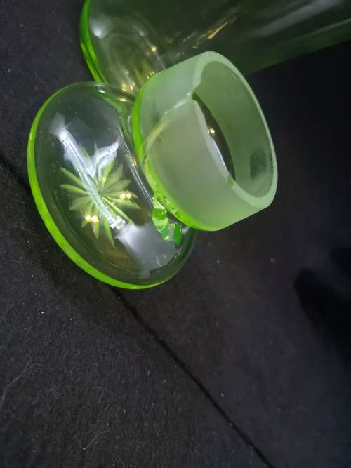 Uranium glass container - the lid has damage but you cant see it when displayed