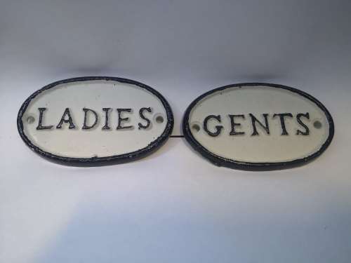 Cast iron ladies/gents signs