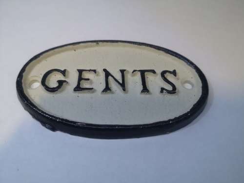 Cast iron ladies/gents signs