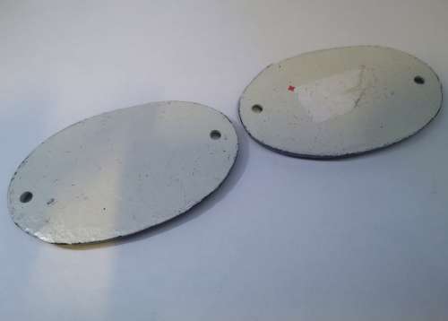 Cast iron ladies/gents signs