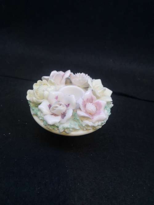 Porcelain finger hole candle holder