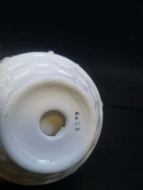 Porcelain finger hole candle holder