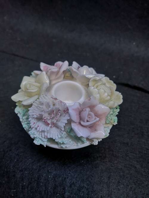 Porcelain finger hole candle holder