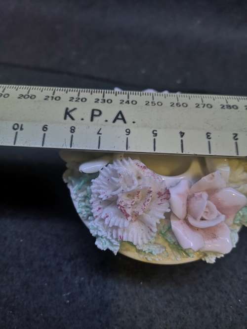 Porcelain finger hole candle holder