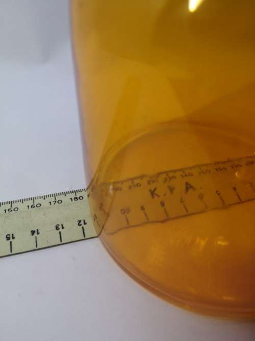 Bright orange glass bottle and glass lid