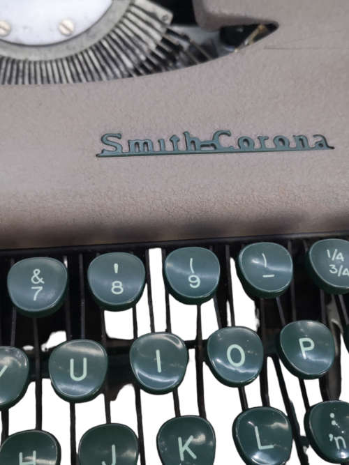 Smith Corona Skyriter Portable Typewriter with metal carry case