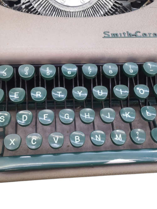 Smith Corona Skyriter Portable Typewriter with metal carry case