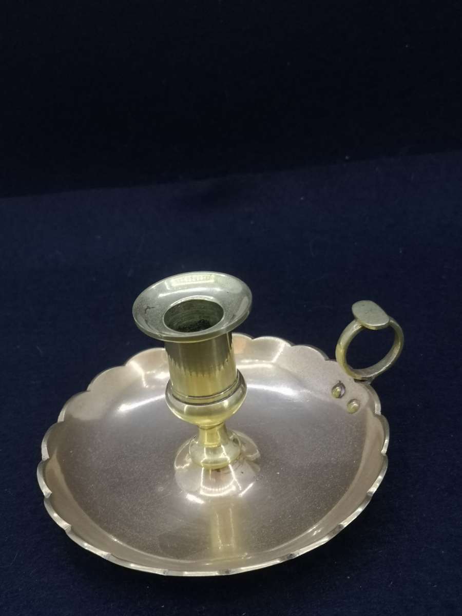 Solid antique brass candle holder/chamber stick