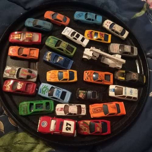 Collection of well loved and played die cast cars