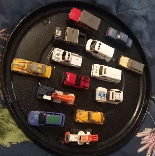 Collection of well loved and played die cast cars