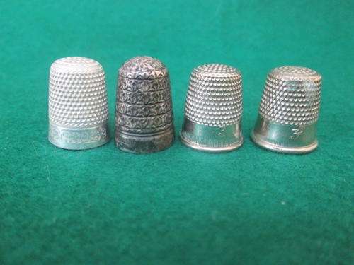 THIMBLES. ANTIQUE. ALL INSCRIPTED. ONE STERLING SILVER.