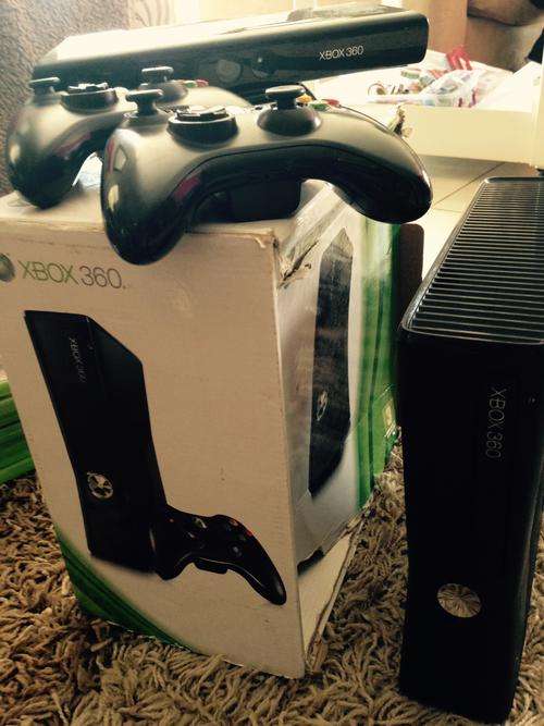 Xbox + Kinect + 2 Wireless Controllers + Games and more