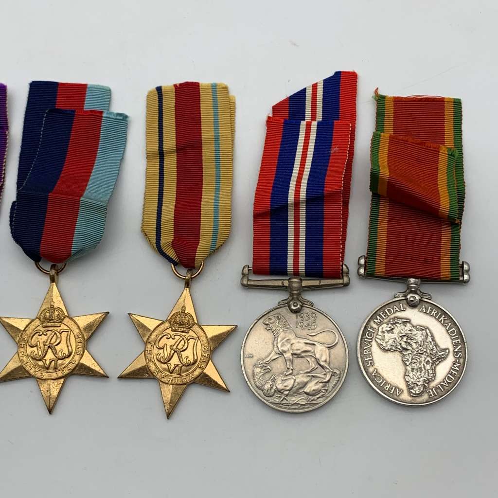 WW1 & WW2 Medals Group (7) `CLR. SJT. H.G. HOLMES` (POTCH. CDO & S.A.N.L.C.)