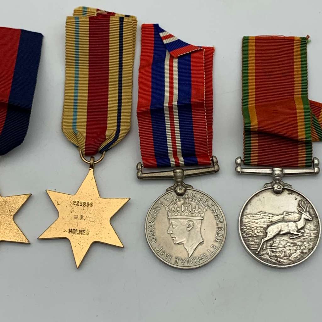 WW1 & WW2 Medals Group (7) `CLR. SJT. H.G. HOLMES` (POTCH. CDO & S.A.N.L.C.)